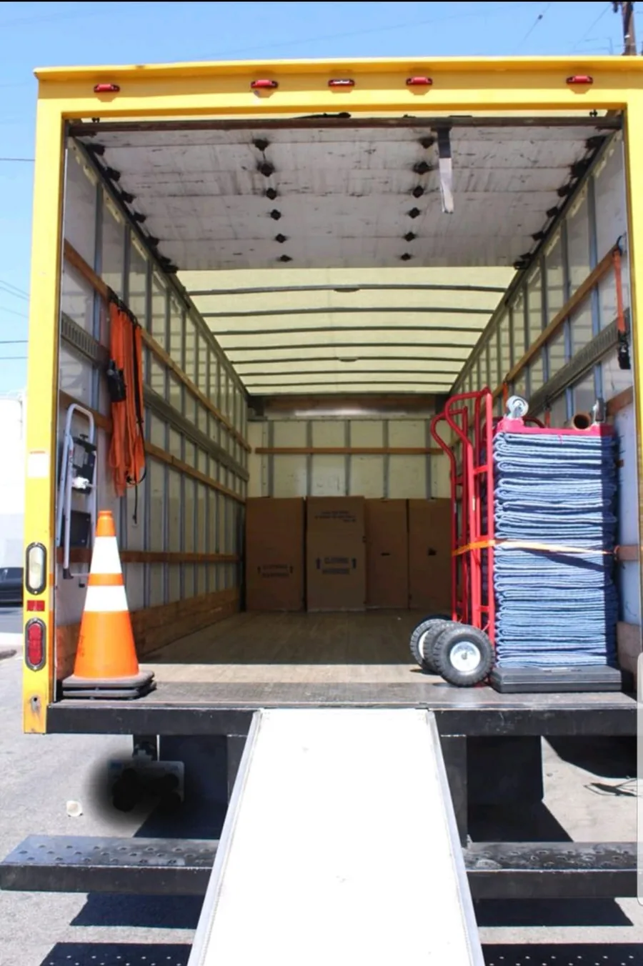 Moving equipment and protective blankets ready for a job